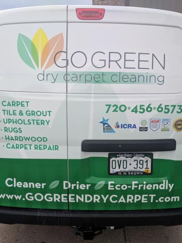 go green dry carpet cleaning team 2