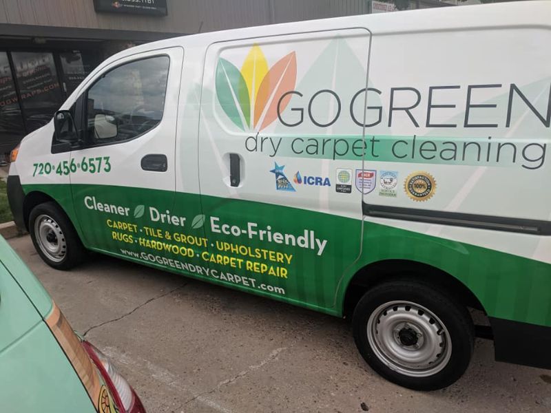 go green dry carpet cleaning team